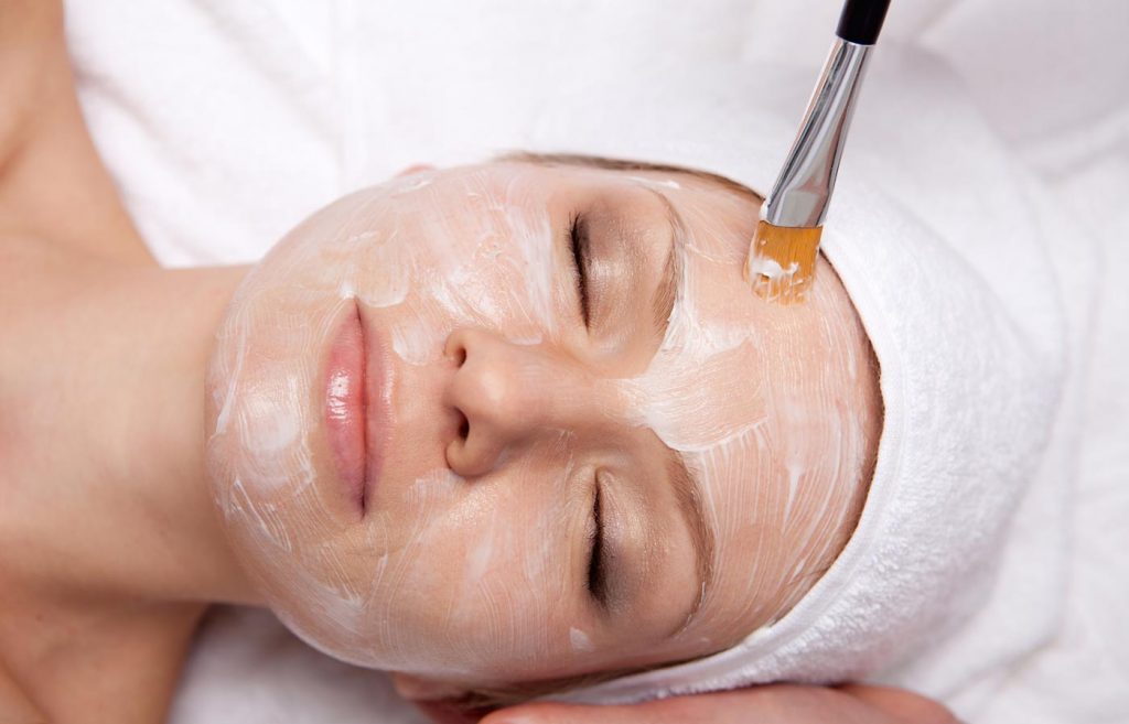 Woman having a facial treatment